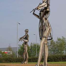 Joan Shannon: 'Musicians from Dancers sculpture outside Strabane Lifford in Ireland', 2011 Color Photograph, Landscape. Artist Description:   Large, metal, figure, sculpture, musician, dancer   ...