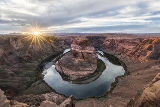 Jon Glaser: 'light at horsheshoe bend', 2017 Color Photograph, Landscape. Horseshoe Bend is portion of the Colorado river just outside of the town of Page in Arizona. The color of the rocks, cliffs and sand will change thoughout the day depending upon where the sun is located in the sky. In the distance are the Paria Plateau and Vermillion Cliffs. ...
