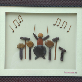 Jyothi Chinnapa Reddy: 'a musician', 2017 Sandstone Sculpture, Abstract. Artist Description: it is made with natural pebble stones and a beautiful frame...