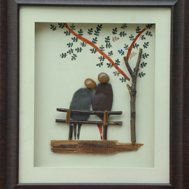 Jyothi Chinnapa Reddy: 'couple sitting under the tree', 2017 Sandstone Sculpture, Abstract. Artist Description: it is made with natural pebble stones and a beautiful frame...