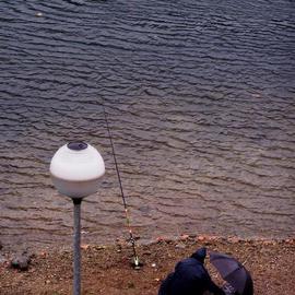 Luise Andersen: 'WAIT FOR BITE  at rivershore in Lecco Italy', 2005 Color Photograph, Other. Artist Description: . . . He was at the rivershore almost everyday. . Always different locations. . but within sight. . . It rained. . . and he had chosen this location right under my window. . within direct view . . .  I like the wet deeply saturated colors . . I was  curious how long he would wait for the bite. .  was until ...