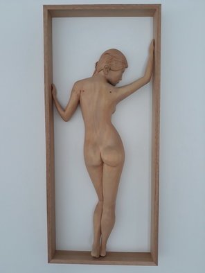 Lee Forester: 'framed female nude', 2019 Wood Sculpture, Nudes. Based on a live model in my studio, I carved this timeless pose from English Lime- Wood and mounted it in a frame made of Eucalyptus plywood. I find that the natural beauty of wood complements the soft curves of the feminine figure perfectly and the smooth finish invites the ...
