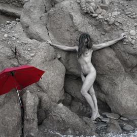 Girl with a red umbrella By Manolis Tsantakis