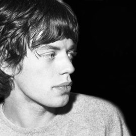 Paul Berriff: 'Mick Jagger', 1964 Black and White Photograph, Music. Artist Description:  Mick Jagger in his dressing room at the Gaumont Theater in Doncaster, England 1964 during The Rolling Stones tour.  The photograph comes signed on the verso by the photographer Paul Berriff with limited edition number and authenticity certificate ...
