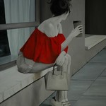 red blouse waiting for him By Peter Seminck