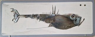 Vladimiras Nikonovas: 'fish ciborg', 2022 Assemblage, Fish. Assemblage made ofold metal parts. Base wood dust board. ...