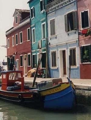 Ruth Zachary: 'Colors of Burano II', 1997 Color Photograph, Boating. Island of Burano, Venice, Italy.  Famous for its hand- made lace and its colorful charm. Whimical little boat dressed- up in red, yellow and blue.  Backed by homes decked out in rose, turquoise and lavendar. Variety of geometric shapes contrast with the wonderful curve of the boat.  Limited edition, signed ...
