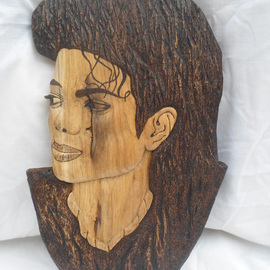 Stefan Irofte: 'Sculpture Wood Michael Jackson', 2014 Wood Sculpture, Celebrity. Artist Description:  A unique and original art work done by hand in wood with distinction. This is a Michael Jackson portret made in oak wood. Initially the wood was in the form of a thick plank and it has been cut in three equal parts and then join together. The ...