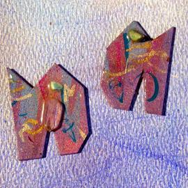 crystal stamp ear ornaments By Richard Lazzara