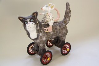 Suzanne Noll: 'Ratz N Katz', 2009 Mosaic, Cats.     Ratz- N- Katz is a ceramic cat and rat sculpture made of high fire clay and various glazes. Katz mosaics are made of metal coins while Ratz are of broken mirror and colored glass. Katz is riding on a wooden axle attached to antique toy wagon wheels where I incorporated...