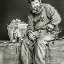 Charles Rankin: 'street life', 2015 Black and White Photograph, Urban. Artist Description: Man sitting on wall at parking garage, ...