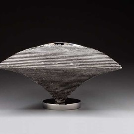 Ted Schaal: 'Equilibrium III', 2009 Steel Sculpture, Geometric. Artist Description:   The Stainless steel Equilibrium III has a funky twist to the texture as it wraps around the vessel form. The reflection in the 1 thick solid stainless base adds an element of illusion.  ...