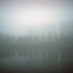 houses in the fog By Albert Rasyulis