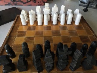 Themis Koutras: 'chess', 2019 Woodworking Art, Architecture. This are hand made chess pieces are sold together note the board is not sold also sell other games ask me about it note that there are 16 pieces on each side in chess the pieces are different sises because they are different pieces to the game the height of ...