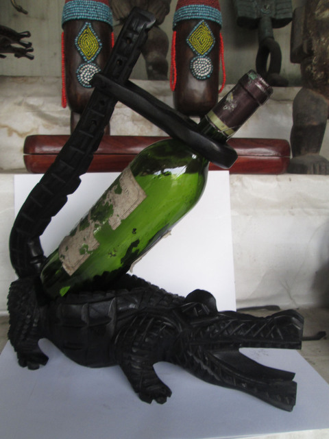 Dimitri Sonkeng  'Wine Holder Crocodile', created in 2015, Original Sculpture Wood.